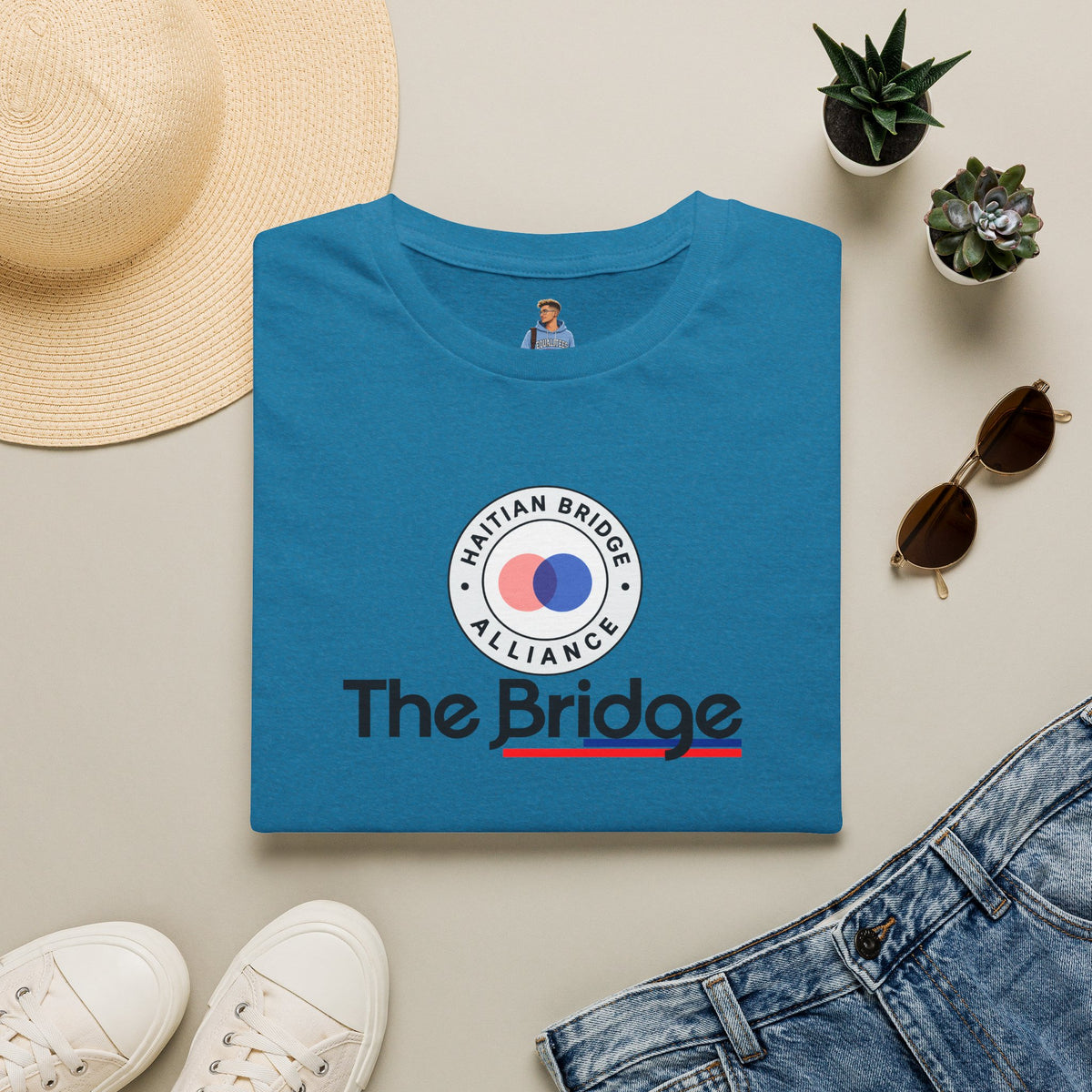 The Haitian Bridge Alliance Logo T-Shirt