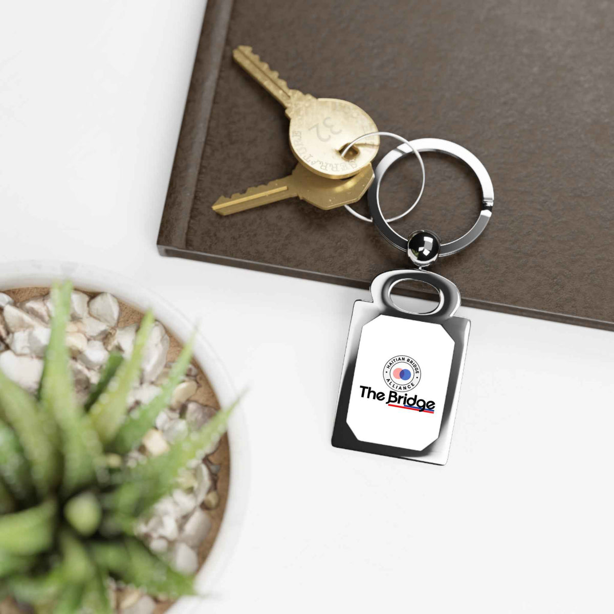 Haitian Bridge Alliance Keychain